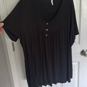 Woman’s black blouse.